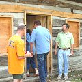 Descendants of the original builder go into the cabin North Log Cabin