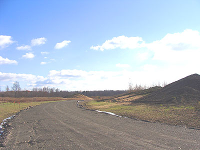 This road ends in a circle in which a combination baseball/soccer field will be located fpc_road