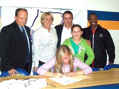 Kathryn Hornibrook (front), (left to right at rear)Lansing Athletic Director Adam Heck, Donna and Dwight Hornibrook, Lansing Girls Soccer Coach LaMaar Peters hornibrook_400