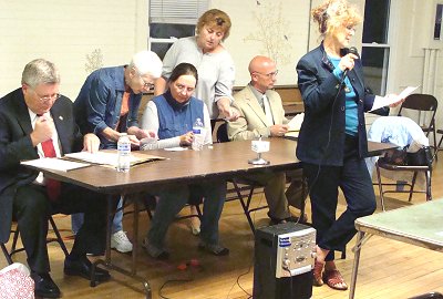 (Left to right) Sheriff Peter Meskill, County Legislator Pat Pryor, Moderator Cynthia Riggin, Town Deputy Supervisor Connie Wilcox, Chief Ken Lansing, Host Marce Bean sheriffdebate_all