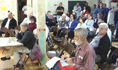 The Lansing Community Center was filled with about 50 people sheriffdebate_room