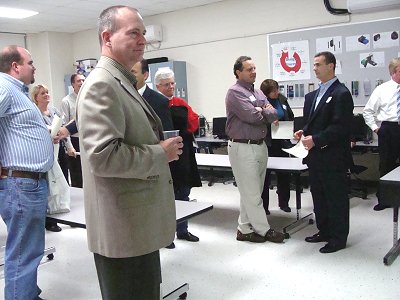 Sponsors and guests tour the lab. Foreground School Board member Glenn Swanson, who also represented donor Borg Warner tech_room