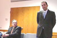 Lansing School Superintendent Stephen Grimm (right) and consultant Mike Coles (seated) aes_ida_publichearing_school_200