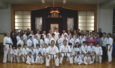Lansing students at Honbu last March. Standing at left: Robin McColley. Seated front, center: Kaicho Nakamura and Nidaime Nakamura. Standing at right: Gail Lajoie clsk_Honbu400
