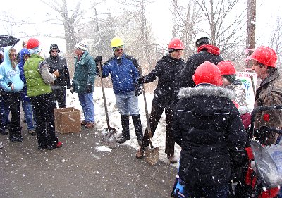 The Gagnon family joins Habitat officials and volunteers to break ground for the Sperry Lane house hfhfeb_shovels