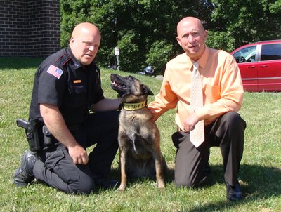 (Left to right) Deputy Shane Spencer, Rock, Sheriff Ken Lansing k9_spencerrocklansing