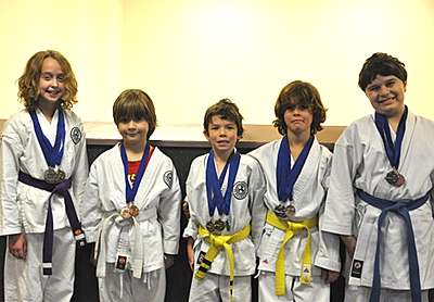 Members of the Ithaca Genbu Kai Dojo who competed at the New Jersey Genbu Kai Annual Karate-Do Championships. Left to Right: Adelaide Tracey, Gordan Webber, Jacob Ouellette, Malcolm Longaker, and Ronnie Webber. karate_genbukai_