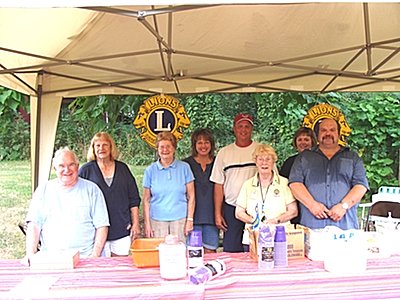 Left to right: Lansing Lions Bob Miller, Phyllis Howell, Betty Ellis, Sue French, Jack French, Noni Krom, Deb Mann, Wayne Pierce lions_icecream_groupshot400