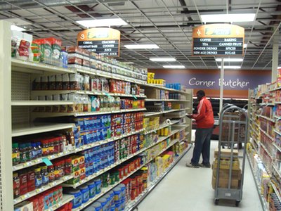 Employees have been busy stocking shelves this week. Store manager Don Taylert says he wants as much done this week as possible to make next week's opening go smoothly. lm09 stocking
