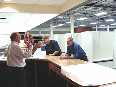 The customer service counter will feature two cash registers, one with a lower counter so that people in wheelchairs will be able to reach. lmaug_custserv