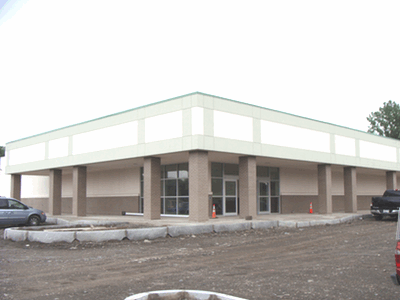 The outside is substantially finished. The big job here is paving the parking lot. lmaug_ext
