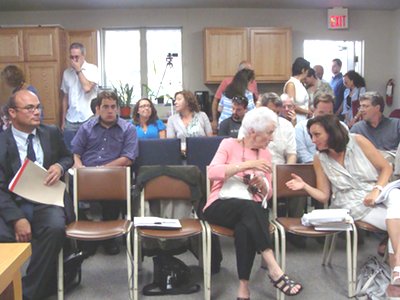 Villagers poured into the Village of Lansing meeting room Tuesday. It was filled to capacity Tuesday for a joint Planning Board and Board of Trustees meeting to gather information about the proposed Lansing Reserve development. By the time the meeting started every seat was taken, and some people listened to the proceedings through the windows from the parking lot. lr_audience