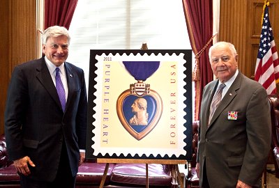 Pictured with Senator Nozzolio is New York State Senator Bill Larkin, who introduced the Legislative Resolution expressing appreciation to the Postal Service for the Purple Heart stamp's new classification. nozzolio_purpleheart