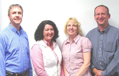 Left to right: Tom Robinson, Betsy Galvin, Current School Board President Anne Drake, and Glenn Swanson schoolvote_400