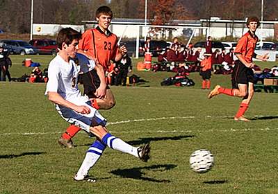 Junior striker Ethan Kutler fires a shot on frame that produced Ellington Hopkins’ first goal of the game, which evened the score at 1 all in the first half soccer_20111105_kutler