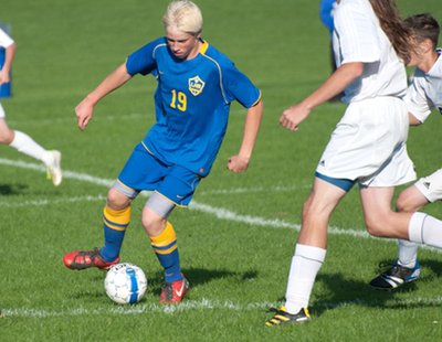 Senior midfielder and tri-captain, Sean Streb handles the ball and avoids defensive pressure in the Moravia midfield during the Bobcats’ dominating victory. soccer moraviastrebb