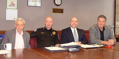 (Left to right) Tompkins County Legislator Peter Stein, Sheriff Ken Lansing, Cayuga Heights Police Chief Tom Boyce, Legislator Brian Robison speeding_400