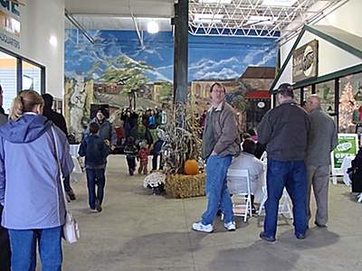 The entertainment stage was set up in front of a giant mural in the mall tmp_stage