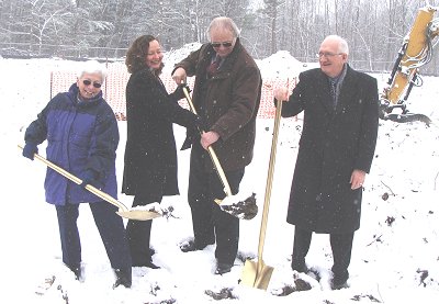 (Left to right) Lansing's Tompkins County Legislator Pat Pryor, TCAD's Heather Filaberto, Transonic Systems CEO Cornelis Drost, and COO Bruce Kilmartin trans_shovels