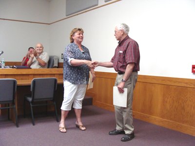 Deputy Supervisor Connie Wilcox presents Lyle Wadell with a certificate of appreciation. wadell_presentation