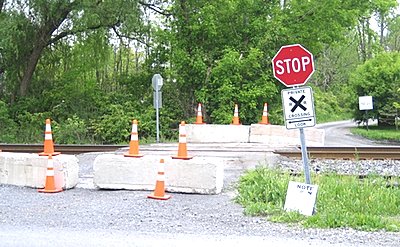 Three years ago these barriers were erected by Norfolk Southern Railroad. xing_closed