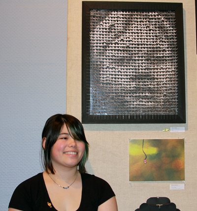 Erika Harper with 'Wish'. The portrait was created with folded paper cranes (see detail above). arnot_harper