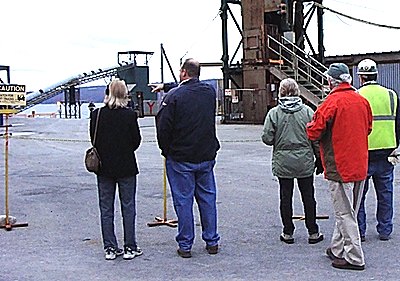 Residents stand near a mine shaft to experience first hand how loud - or not so loud - it is cargillshaft_tour