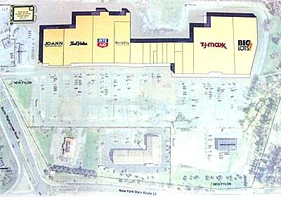 Drawings showed a proposal that would include Joanne fabrics, True Value/Agway, Rite Aid, and Party City at the front of the mall. TJ Max and Big Lots are located at the rear, with smaller stores and restaurants between the two ends. An enclosure to be used by True Value Hardware is shown at the upper left. cm_aerial