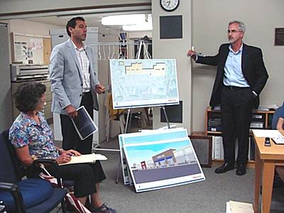 Brixmore Construction Vice President Haig Buchakjian and architect James Knittel Monday presenting plans for the Cayuga Mall cm_preso