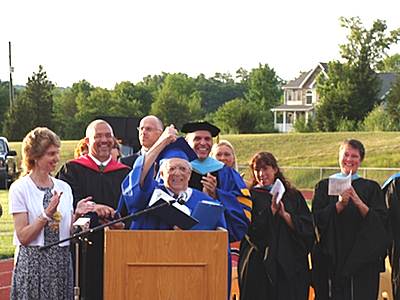 Fred Voss after receiving his degree fv_thumbsup