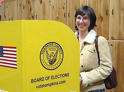 Lansing Councilwoman Katrina Binkewicz voting Tuesday katrinavote
