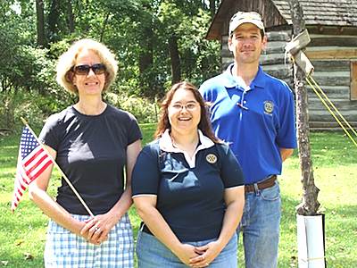 Standing by the Liberty Tree are (lefty to right) Marge Brodhead, and Rotarians Vickey Beaver and Jase Baese libertytree_three