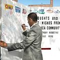 Ithaca Mayor Svante Myrick signing the giant 'get well' card myrick_card