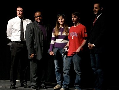 Left to right: Don Austin, Assistant Director Community Service and Leadership Development, Ithaca College; John Rawlins, Assistant Director, OSEMA-Multicultural Affairs, Ithaca College; Irene Case, 9th Grade New Roots Charter School Student, New Roots Charter School; Jacob Gelber, 12th grade New Roots Charter School Student, Svante Myrick, Mayor of Ithaca. nr_mlk_400