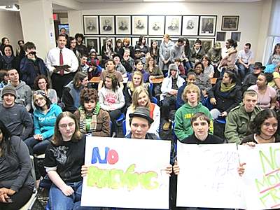 Ithaca Mayor Svante Myrick (upper left in white shirt and tie) meets with New Roots Charter High School students. nrs_mayorwelcome1