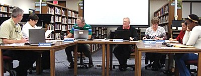 Lansing School Board (left to right) Tom Robinson, Acting Superintendent Chris Pettograsso, Glenn Swanson, David Dittman, Julie Boles, Christine Iacobucci, Aziza Benson (not pictured is Betsy Galvin) sbrw_schoolboard2012-2013