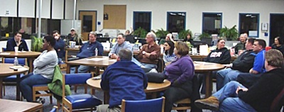 Around 30 people filled the Lansing High School library Thursday night for a frank discussion of the school budget, higher taxes, and cuts. schoolbudgetmar1mtg