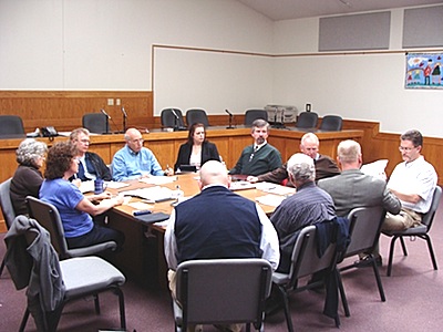 Lansing Sewer Committee: (clockwise from left) Clerk Rachel Jacobson, Supervisor Kathy Miller, Mark Booth, Andy Sciarabba, CJ Delvecchio, Councilman Ed LaVigne, Tom Jones, engineer David Herrick, EFC Environmental Project Manager Terry Deuel, Noel Desch, Tompkins County Director of Assessment Jay Franklin sewer0404_committee