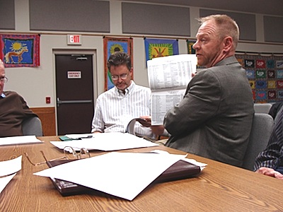 EFC's terry Deuel explains a scoring system that will determine Lansing's eligibility for a loan, and possibly for favorable interest rates. sewer0404_dueul