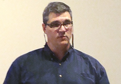 Tompkins County Broadband Committee Member Larry Berger presented a condensed report on committee findings in Lansing Tuesday. He spoke of his own challenges living in an area without an adequate Internet connection, especially as it impacts his children's ability to complete school assignments. tcbc_berger