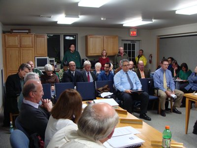 Trustees and Planning Board members hear public comment on a study to be conducted on their neighborhood that will impact Village officials' deliberation on a 65 unit development proposal. v20120131_400