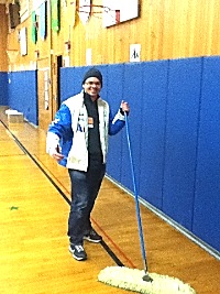 Cleaning up the Lansing Elementary School gym after the Thanksgiving Dinner btc3_sweep_200