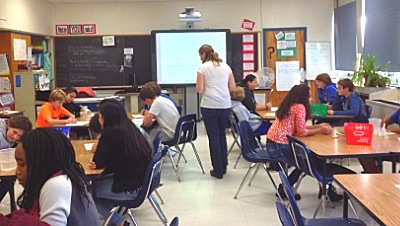 Brazilian engineering, geologists, and statistics students tutoring at Lansing Middle School btc3_tutoring