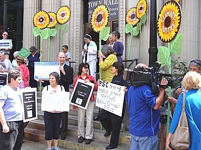 Protesters against repowering the Cayuga plant demonstrated on the steps of the Ithaca Town Hall Monday cppr_protestors
