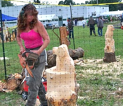 This year's East Shore Festival of the Arts features chain saw artist Penny Towner esfota_townercarving