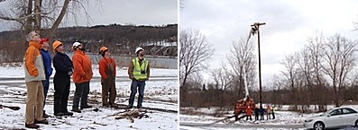 Lansing park officials and NYSEG employees watch as an osprey nesting platform is installed on a 65 foot tall utility pole osprey_cherrypicker