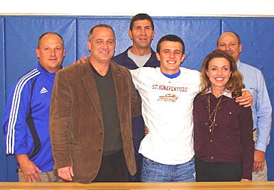 Schutz was joined by his parents and coaches for the signing ceremony. Left to right: Lansing Athletic Director and Soccer Coach Adam Heck, Dave Schutz, Baseball Coach Stuart Dean, Alex Schutz, Lucinda Schutz and Assistant Baseball Coach Mike Herzog schutzbb_coachesfamily