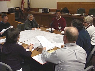 David Herrick (in red sweater) presents the sewer plan to the Lansing Town Board sewer_herrickplan400