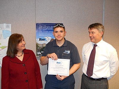 TCAT General Manager, right and Operations Manager Nancy Oltz, left, honor TCAT Bus Operator Jack Shawley with a Certificate of Appreciation. tcat_shawley