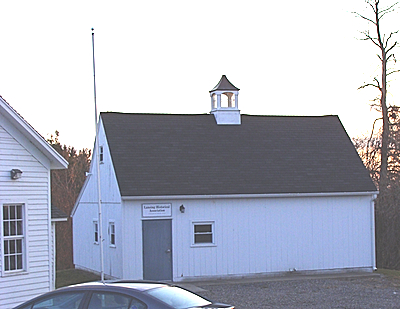 The deteriorating town records building sits next to the historic Field one-room schoolhouse in the Town Hall complex that also includes the Lansing Community Library and the town ballfields townrecords_400